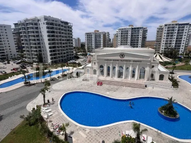MOMENT CYPRUS -İSKELE LONG BEACH CEASER RESORT'TA 1+1 KİRALIK DAİRE AIDAT DAHIL