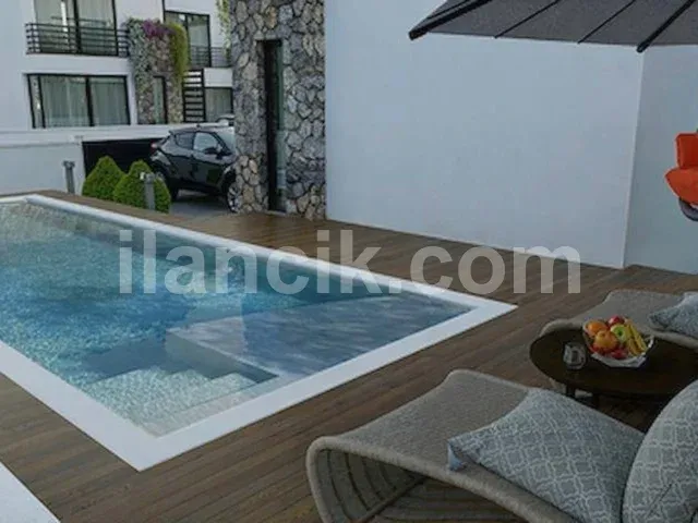 Alsancak'ta Satılık 4 Yatak Odalı Modern Villa