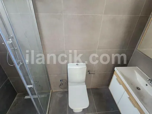 Alsancak'ta Satılık 2 Yatak Odalı Daire - Bahçeli ve Havuzlu - 15
