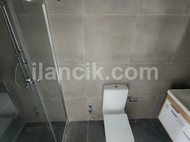 Alsancak'ta Satılık 2 Yatak Odalı Daire - Bahçeli ve Havuzlu - 18