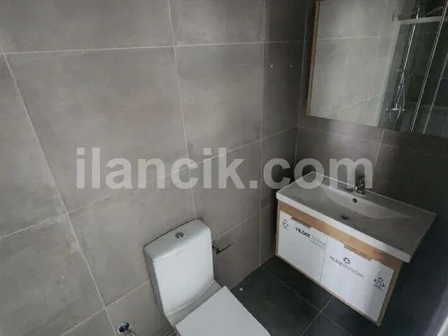 Alsancak'ta Satılık 2 Yatak Odalı Daire - Bahçeli ve Havuzlu - 19